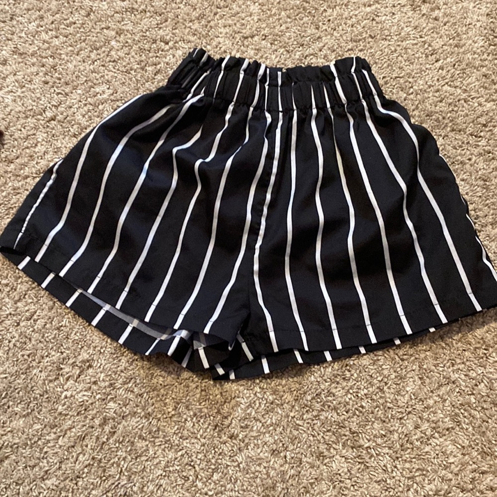 Black and white striped shorts.     Color: black and white.  Size: S